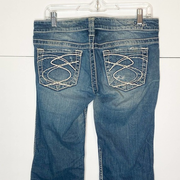 Silver Jeans, distressed jeans, flare bottom jeans, medium wash distressed jeans - Picture 11 of 12